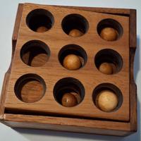 Gioco rompicapo in legno 