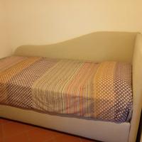 Letto singolo con testata