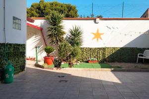Casa con giardino