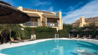 Appartamento in villaggio con piscina