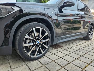 4 Cerchi BMW con pneumatici estivi e invernali