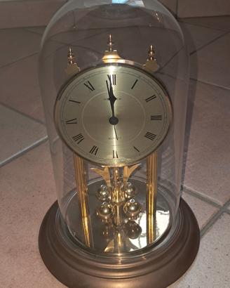 Orologio da tavolo a pendolo rotante
