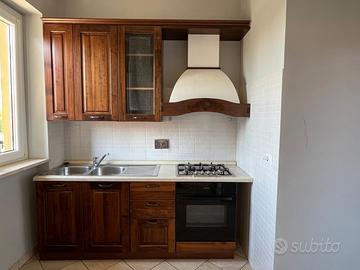 Cucina in legno stile arte povera