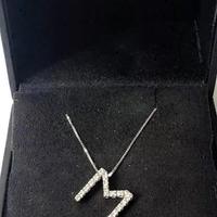 COLLANA LETTERA ORO 18kt. CON DIAMANTI NATURALI