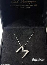 COLLANA LETTERA ORO 18kt. CON DIAMANTI NATURALI