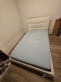 Letto 1 piazza e mezza con rete a ribalta cassone