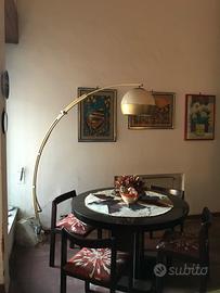 Tavolo tondo con sedie