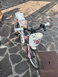 Bicicletta bambina  rosa con cestino e seggiolino
