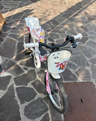 Bicicletta bambina  rosa con cestino e seggiolino