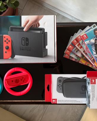 Nintendo Switch + giochi + accessori 🔴🔵