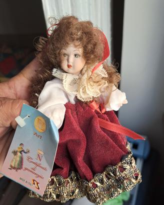 Bambola in porcellana