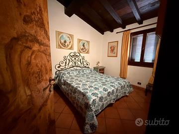 Letto matrimoniale in ferro battuto decorato