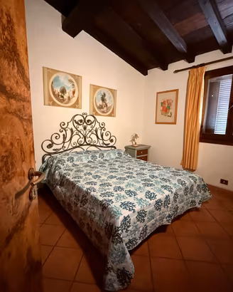 Letto matrimoniale in ferro battuto decorato