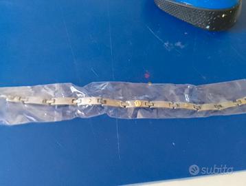 Bracciale uomo acciaio e oro