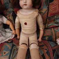 bambola in biscuit e corpo snodato in capretto 