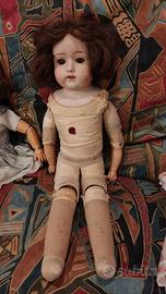 bambola in biscuit e corpo snodato in capretto 