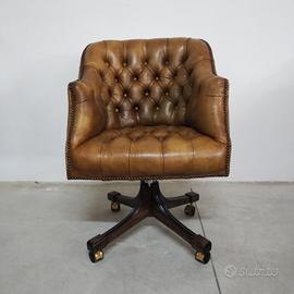 Poltrona chesterfield girevole.    Chester 