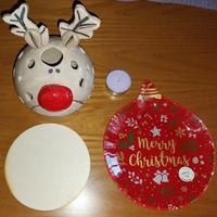 Portacandele a forma di renna natalizia.