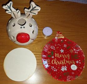 Portacandele a forma di renna natalizia.