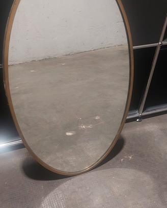 specchio ovale in ottone