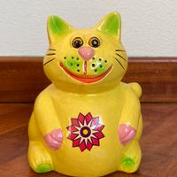 Gatto salvadanaio vintage in ceramica gialla.