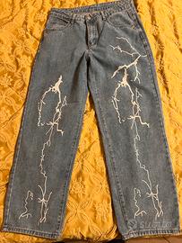 Jeans con stampa fulmine per uomo