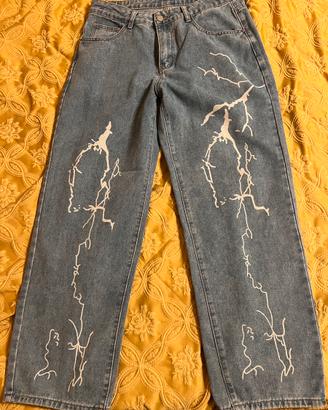Jeans con stampa fulmine per uomo