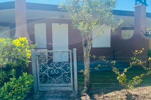 Bilo con giardino privato in residence con piscina