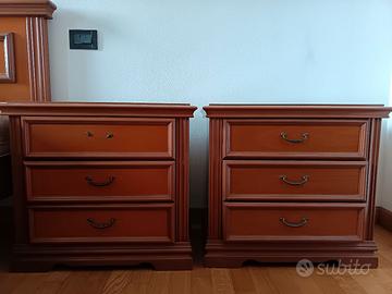 Letto matrimoniale con due comodini