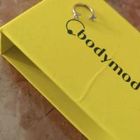 Horseshoe in titanio color oro