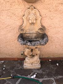 Fontana a parete cemento angelo