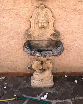 Fontana a parete cemento angelo
