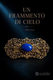 Spilla antica filigrana dorata con cabochon blu