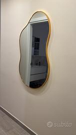 Specchio asimmetrico