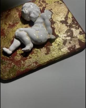 Putto in ceramica vintage