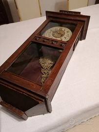 orologio a pendolo da parete vintage