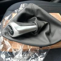 Cuffia e pomello BMW serie 1 