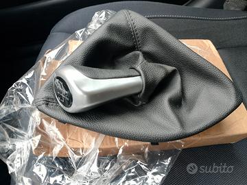 Cuffia e pomello BMW serie 1 