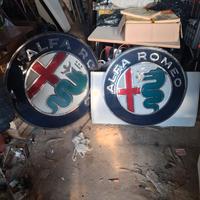 Due insegne luminose Alfa Romeo