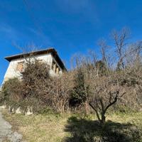 Casa con terreno edificabile