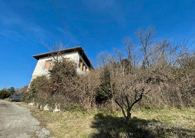 Casa con terreno edificabile