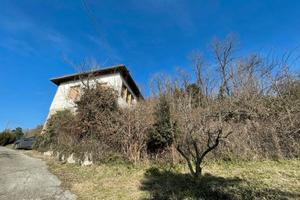 Casa con terreno edificabile