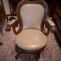 poltrona da barbiere girevole