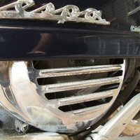 Griglia cromata copriventola volano Vespa PX