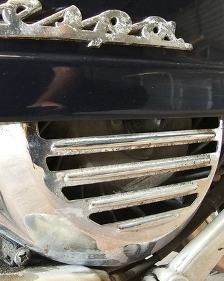 Griglia cromata copriventola volano Vespa PX