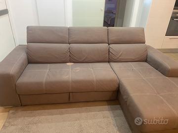 Divano con penisola e funzione letto