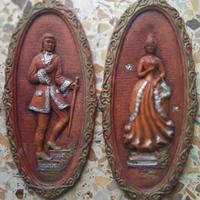 Coppia di quadri in bassorilievo in gesso