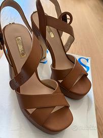 Tacchi Guess