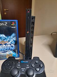 Console Ps2 con giochi, controller e cavi.