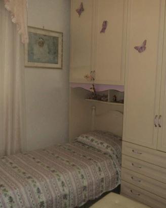 Camera con armadio a ponte